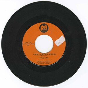 Dance Like an Animal b/w Mighty Rough Road