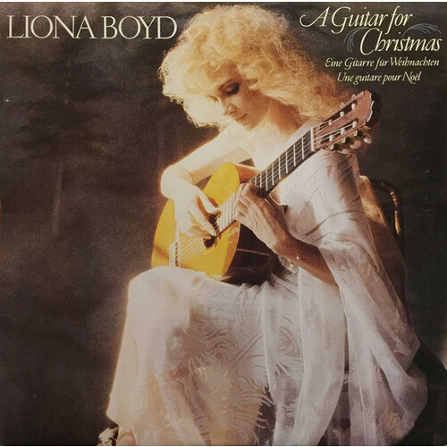 A Guitar for Christmas - Eine Gitarre Für Weihnachten - Une guitare pour Noël