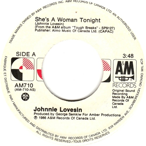 Tough Girls b/w She's a Woman Tonight